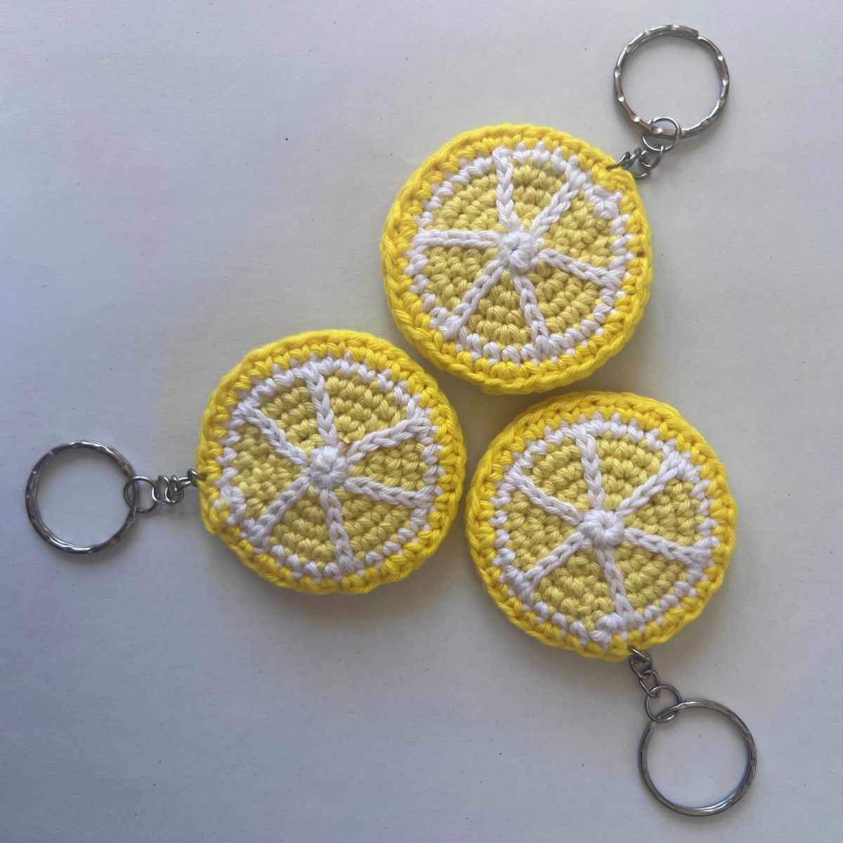 Three hand-crocheted lemon keychains made in Italy — The Italian Stitch